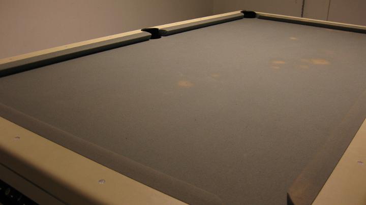 Stains on the pool table.JPG